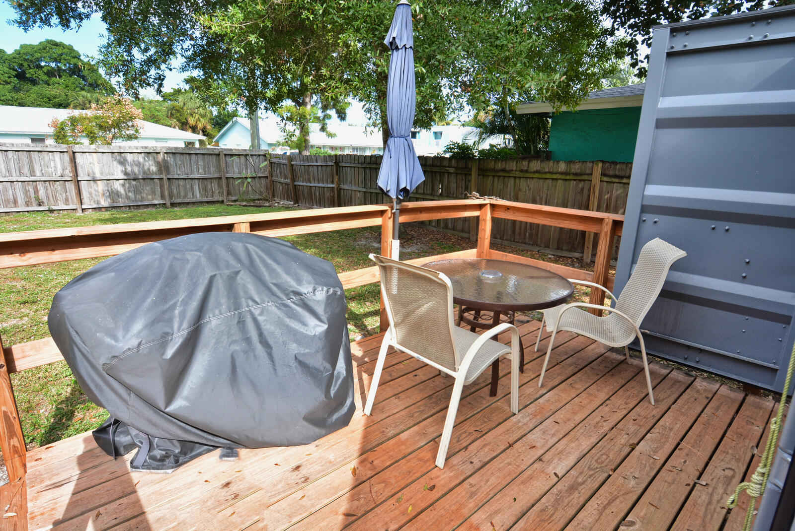 Tbd Southeast Iris Street Stuart, FL 34997 - Photo 28 of 33 a view of a chairs and table on the wooden floor