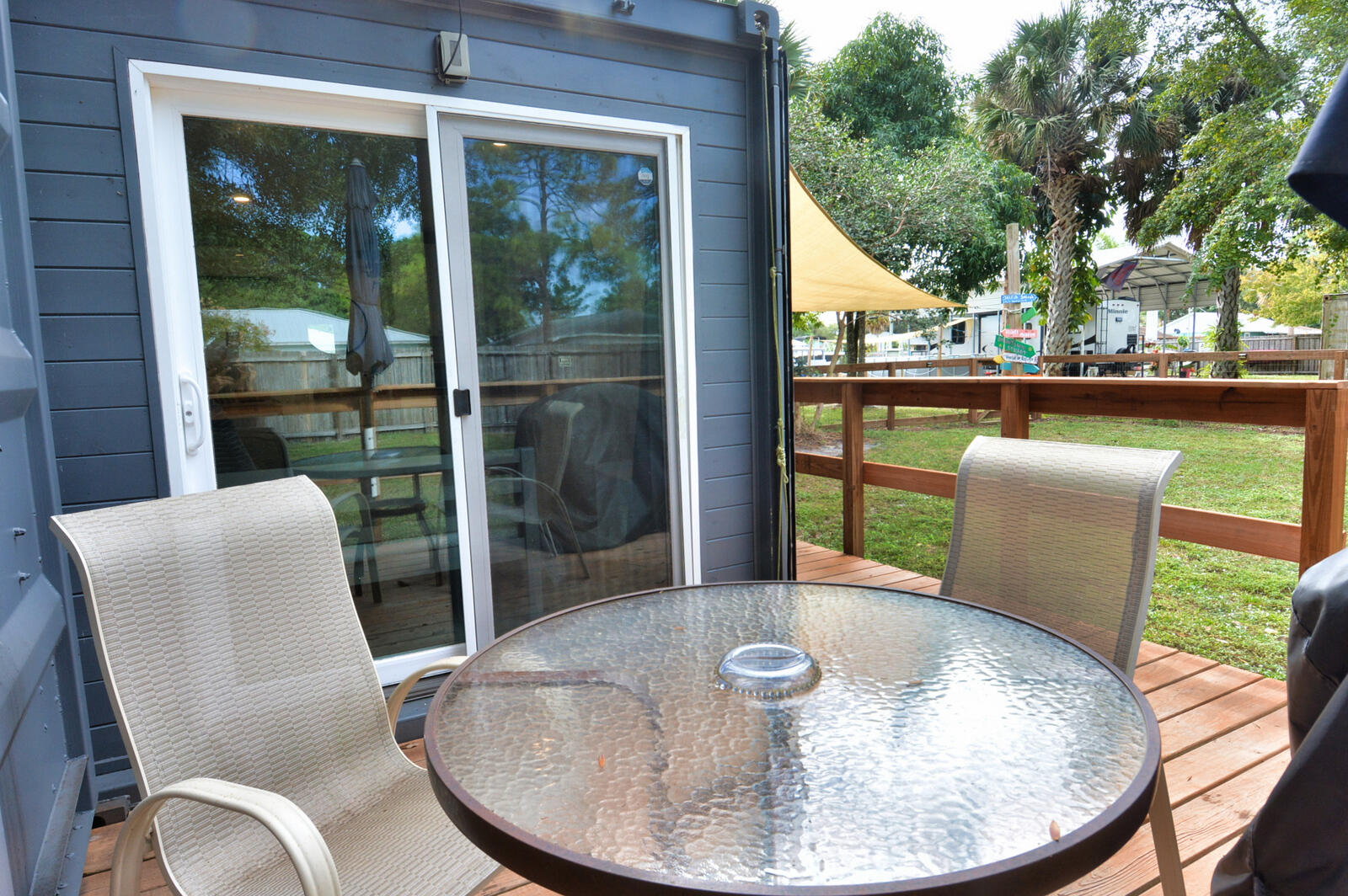 Tbd Southeast Iris Street Stuart, FL 34997 - Photo 29 of 33 a view of a dining room with furniture wooden floor and garden view