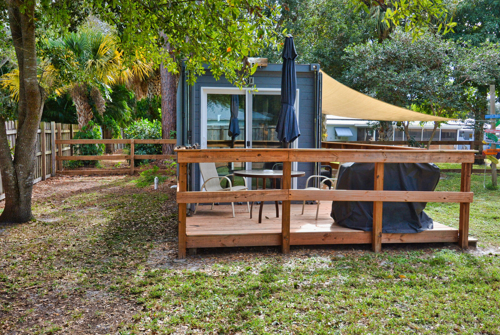 Tbd Southeast Iris Street Stuart, FL 34997 - Photo 4 of 33 a view of a house with a yard