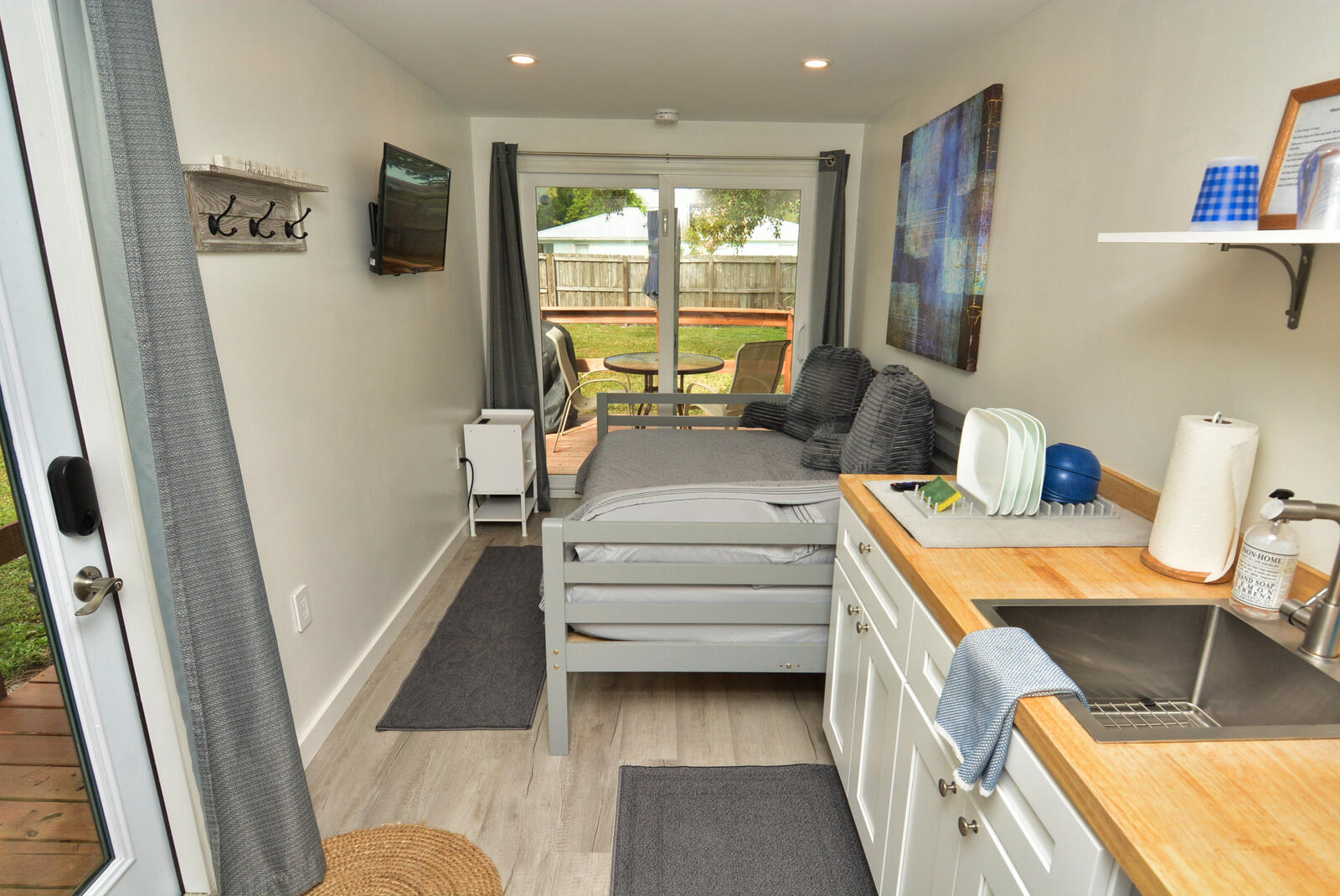 Tbd Southeast Iris Street Stuart, FL 34997 - Photo 10 of 33 a bedroom with a bed and a large window