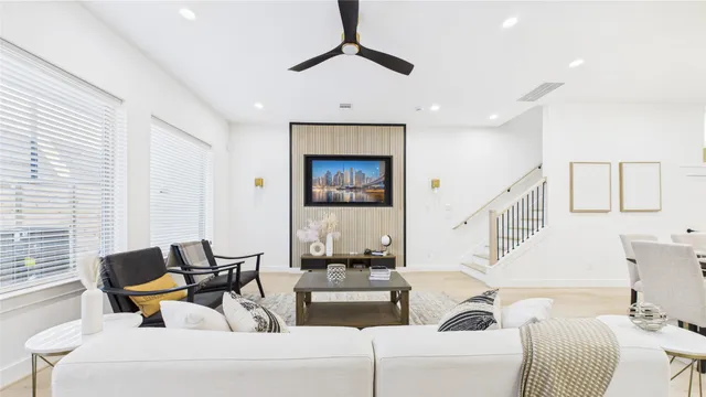 a bathroom with a sink toilet and a mirror