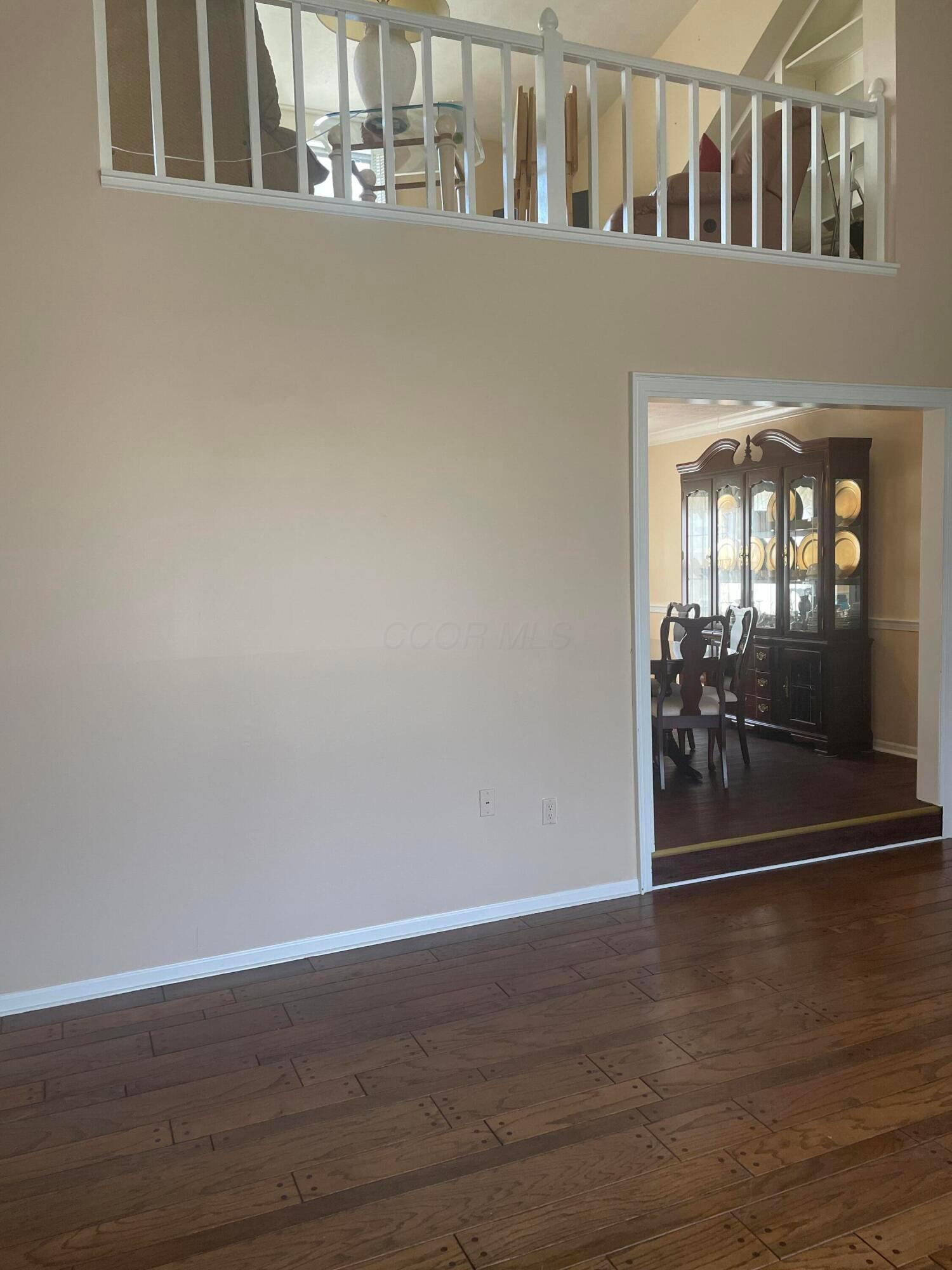 3033 Linmuth Drive West Springfield, OH 45503 - Photo 4 of 22 LIVING ROOM/DINING/2ND FLOOR LOFT