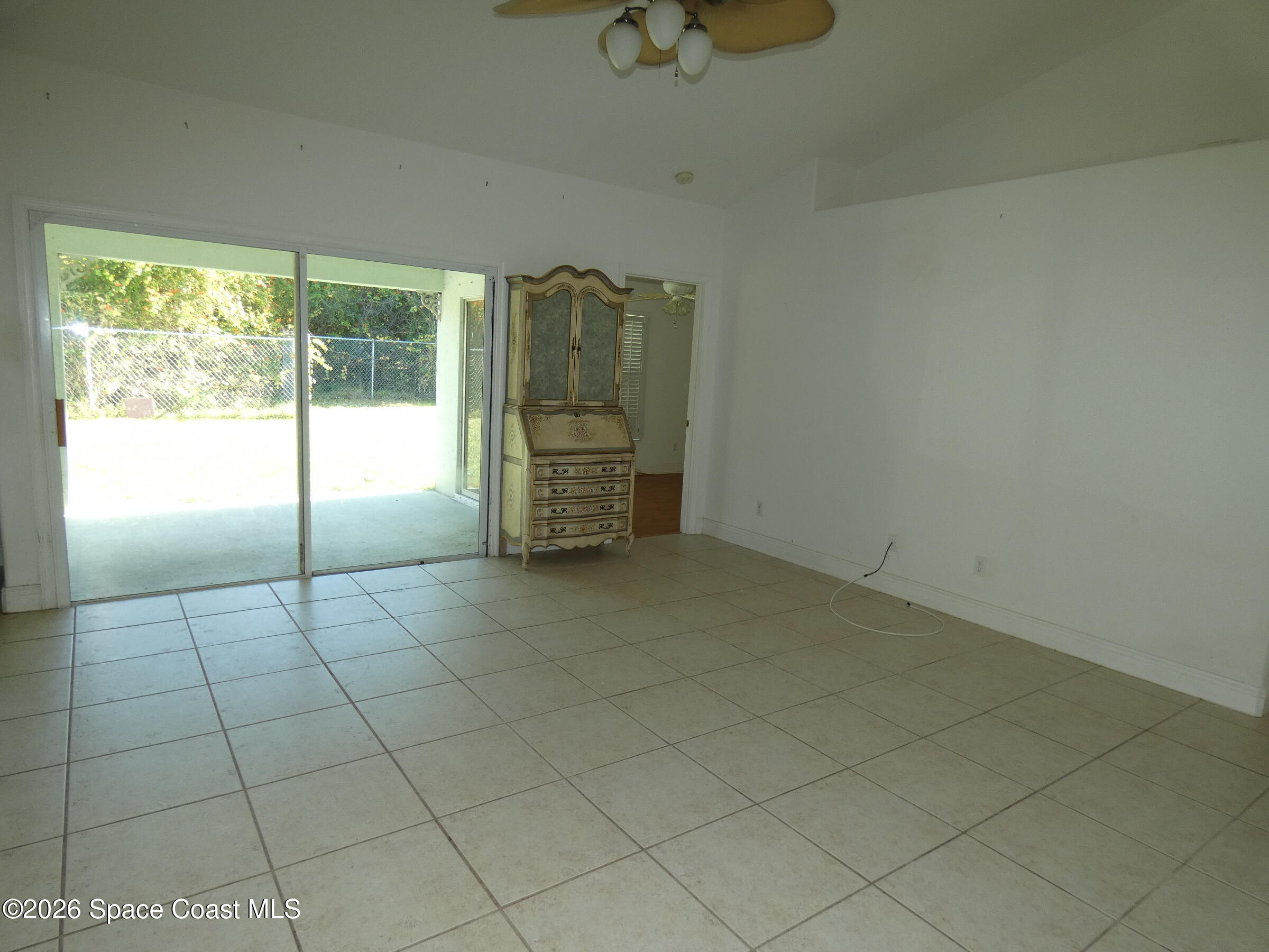 3195 Legendary Lane Melbourne, FL 32935 - Photo 12 of 25 a view of an empty room and window