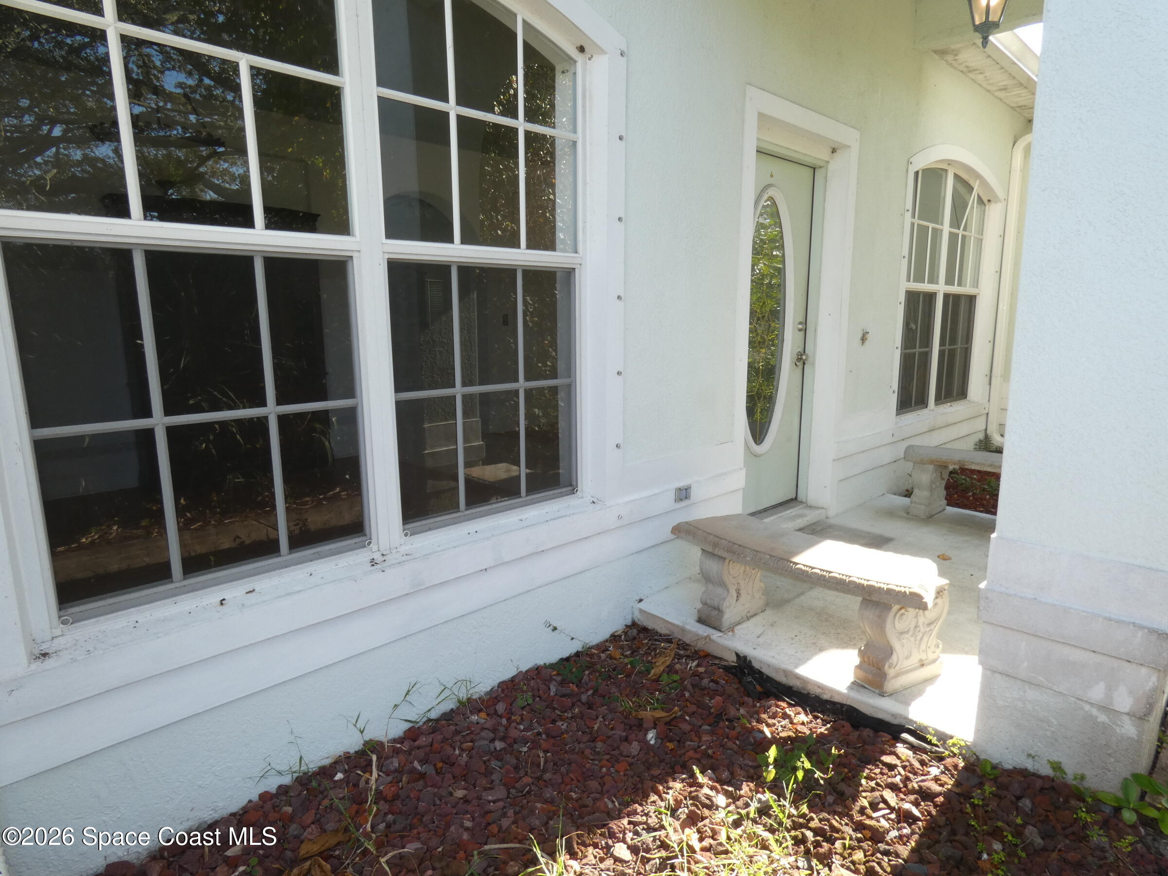 3195 Legendary Lane Melbourne, FL 32935 - Photo 5 of 25 a bathroom with a toilet and a shower