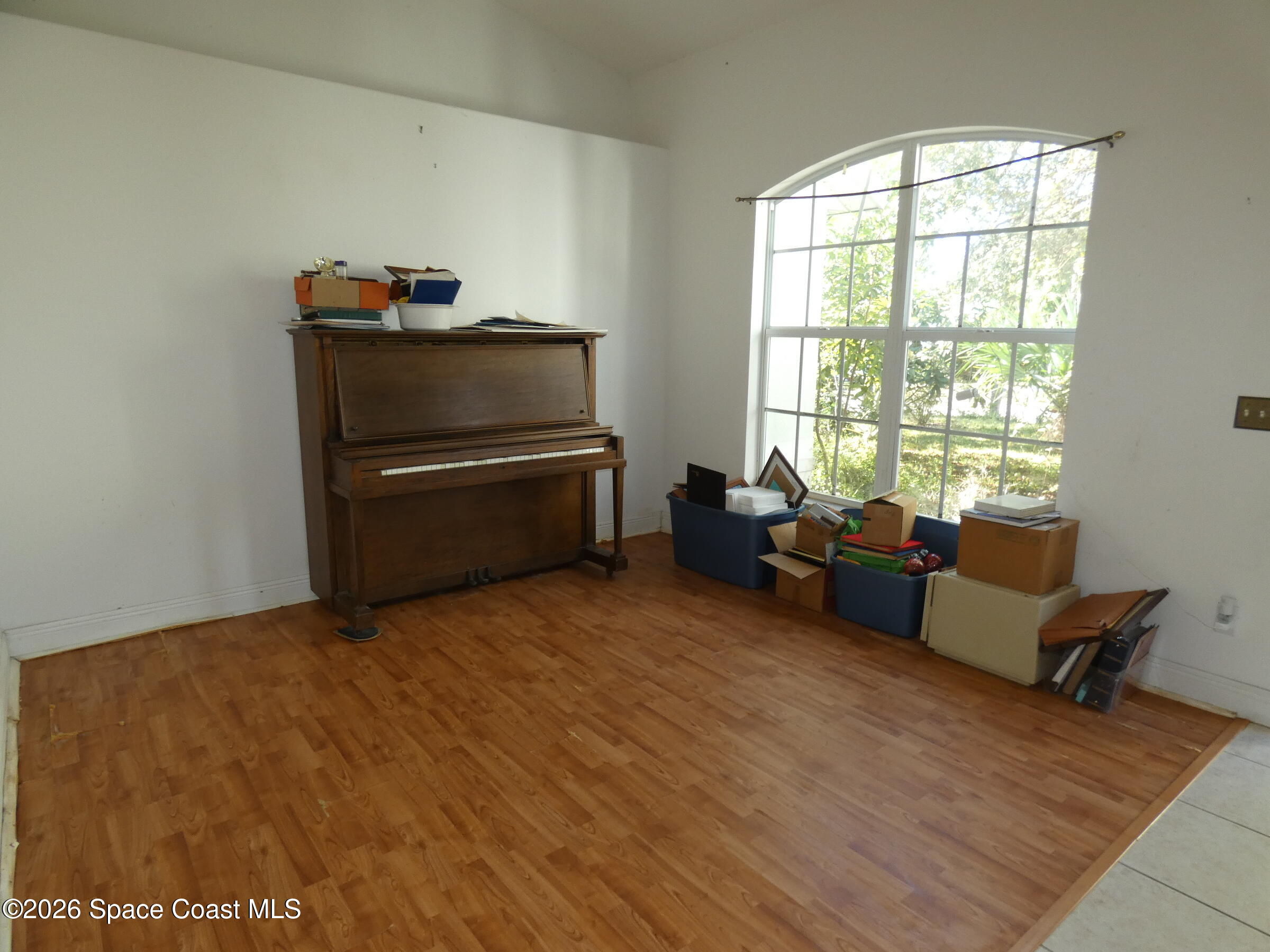 3195 Legendary Lane Melbourne, FL 32935 - Photo 8 of 25 a living room with furniture