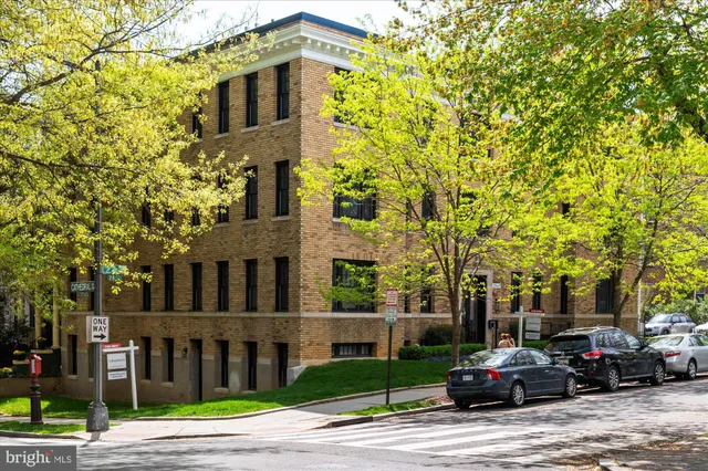 a front view of a building with street view