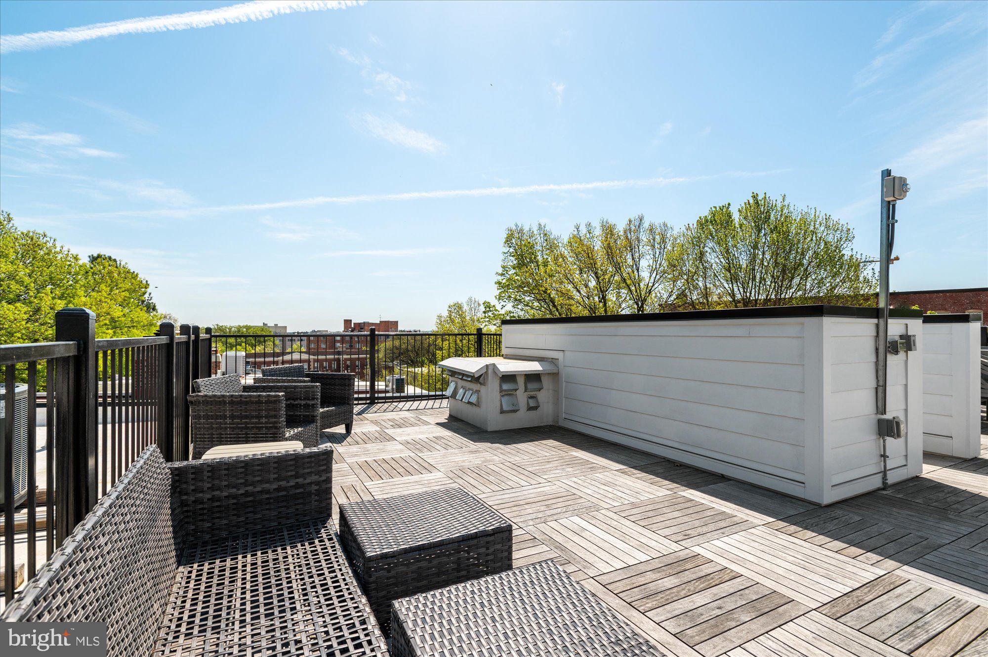 2869 28th Street Northwest, Unit 301 Washington, DC 20008 - Photo 24 of 31 a view of a terrace with sitting area