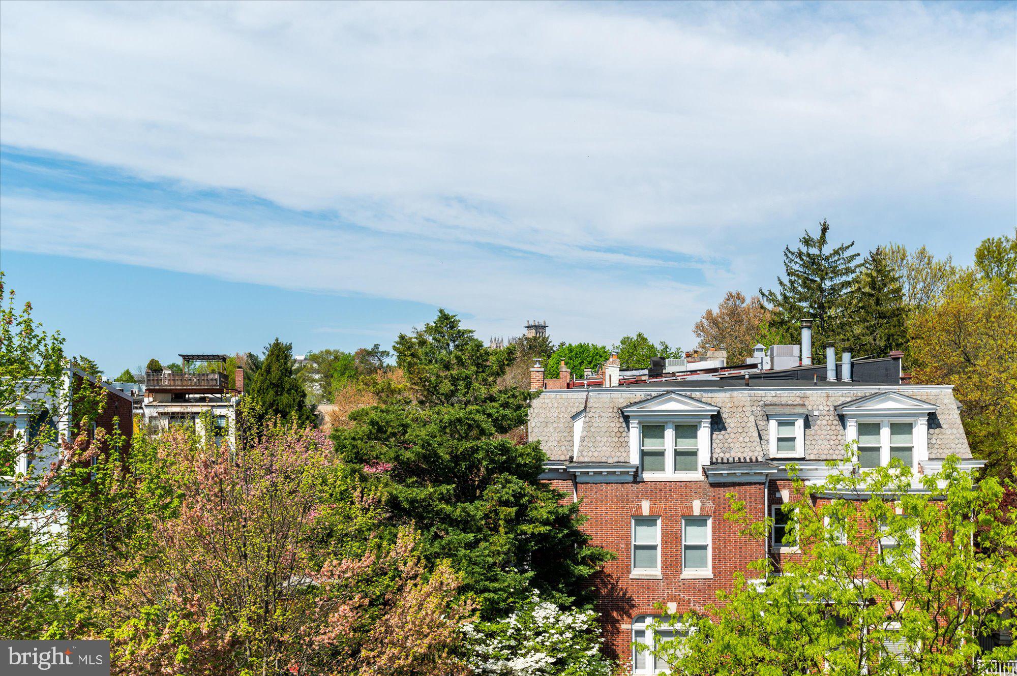 2869 28th Street Northwest, Unit 301 Washington, DC 20008 - Photo 31 of 31 an aerial view of a house with a yard