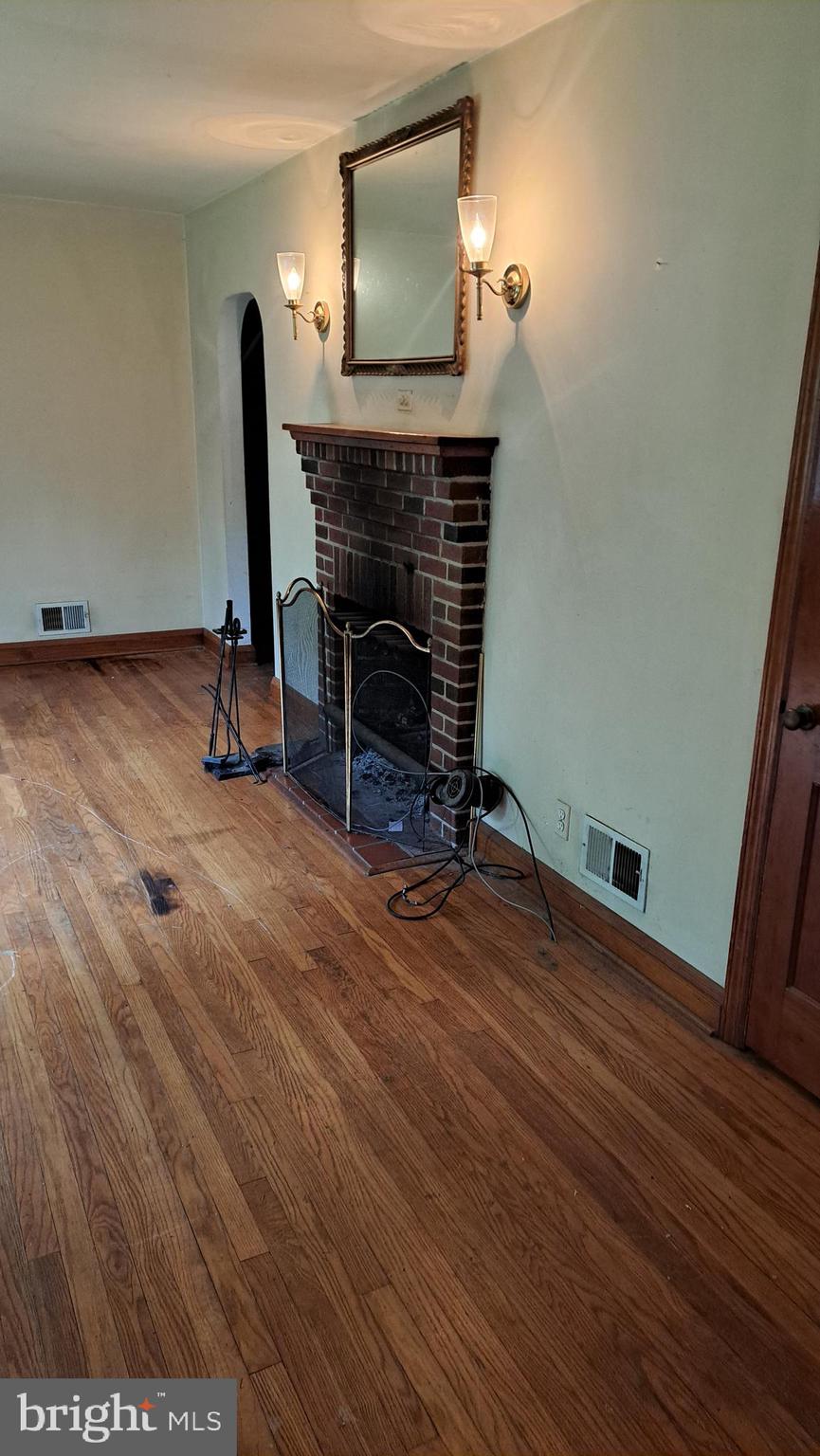 4401 East Joppa Road Perry Hall, MD 21236 - Photo 7 of 32 a view of a room with wooden floor and furniture