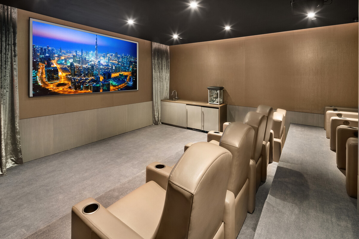 49 Chambers Street, Unit 16C Manhattan, NY 10007 - Photo 13 of 19 a view of a projector room with furniture and screen