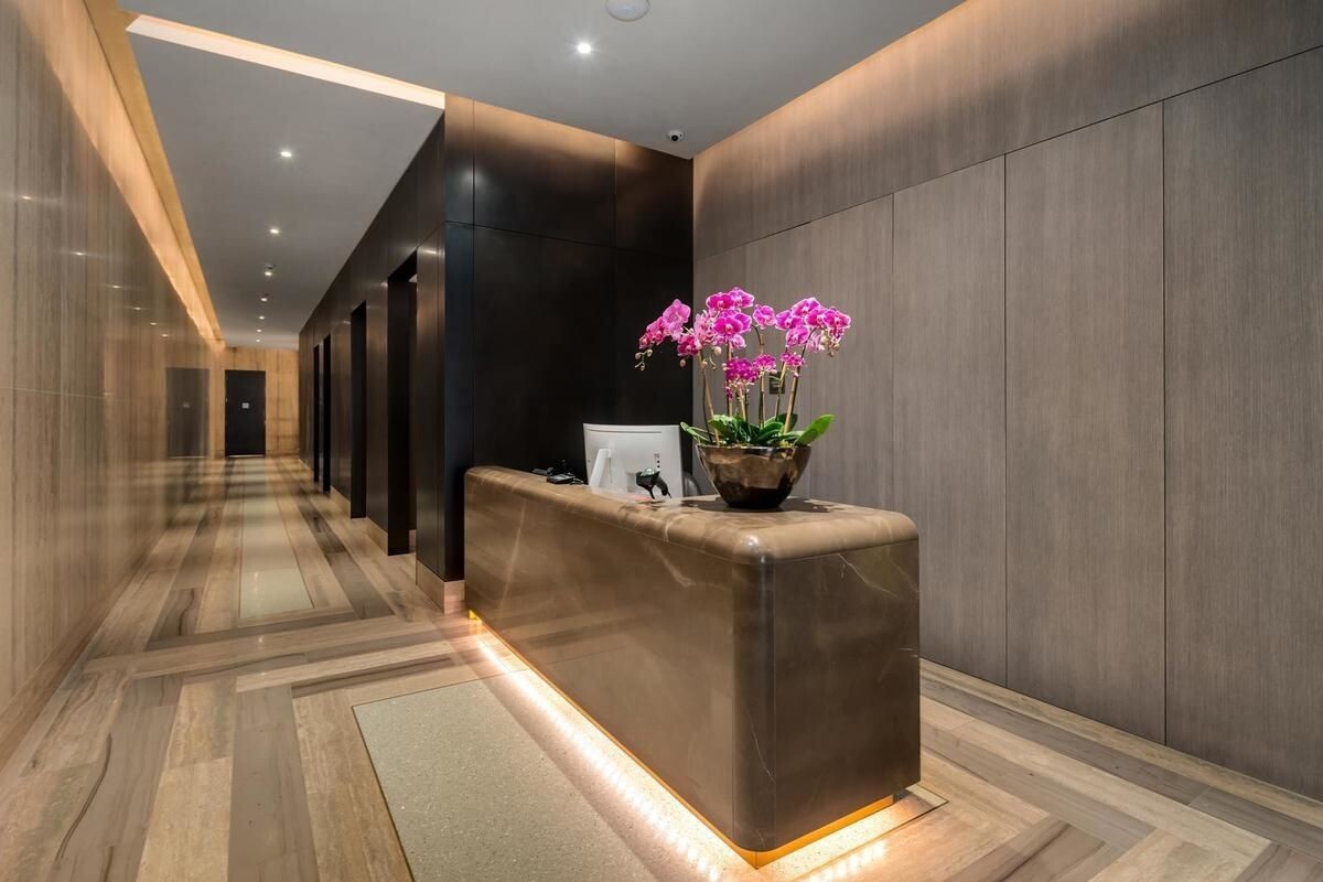 49 Chambers Street, Unit 16C Manhattan, NY 10007 - Photo 7 of 19 a kitchen with a sink and cabinets