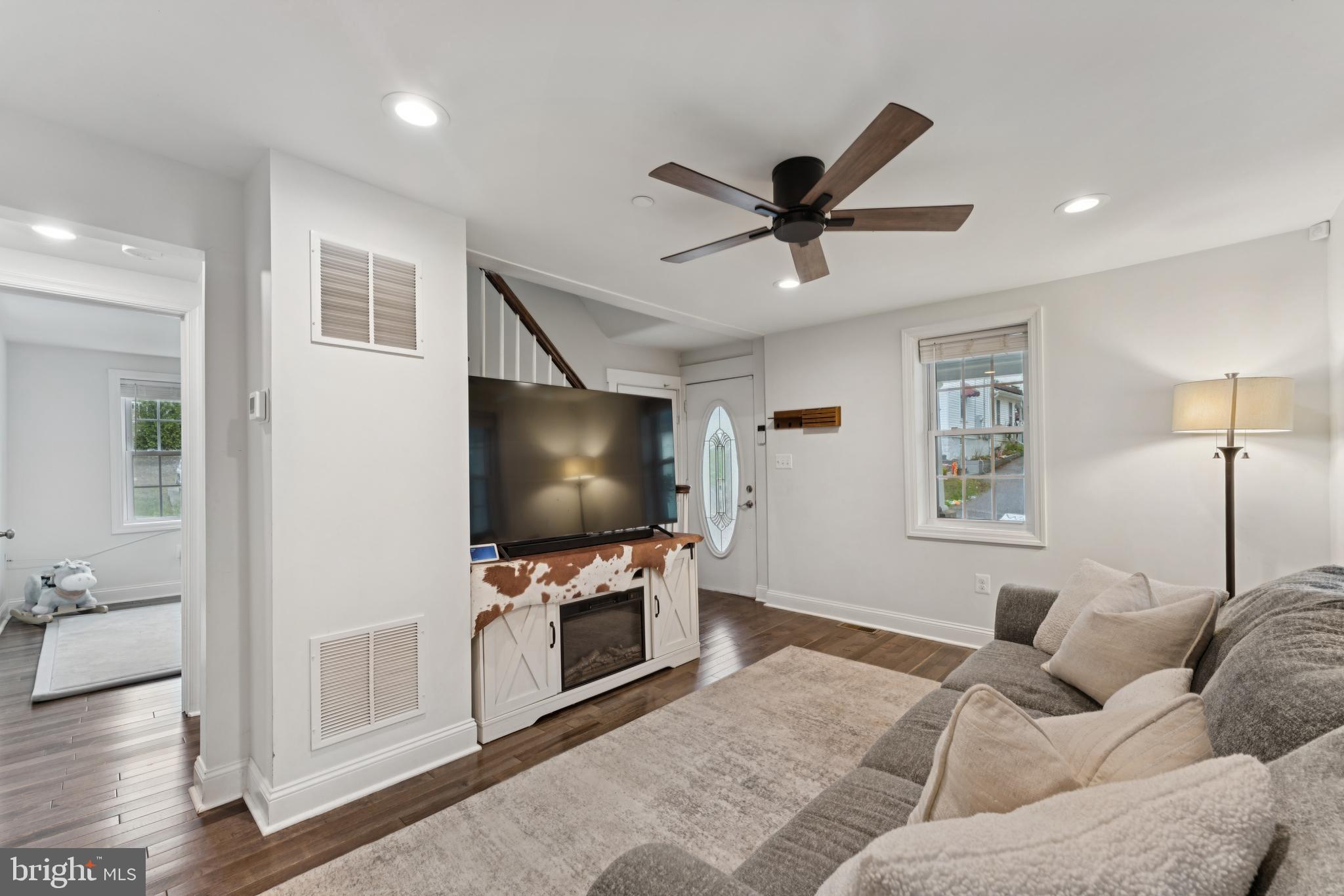 2372 Mayberry Road Westminster, MD 21158 - Photo 3 of 38 a living room with furniture and a flat screen tv