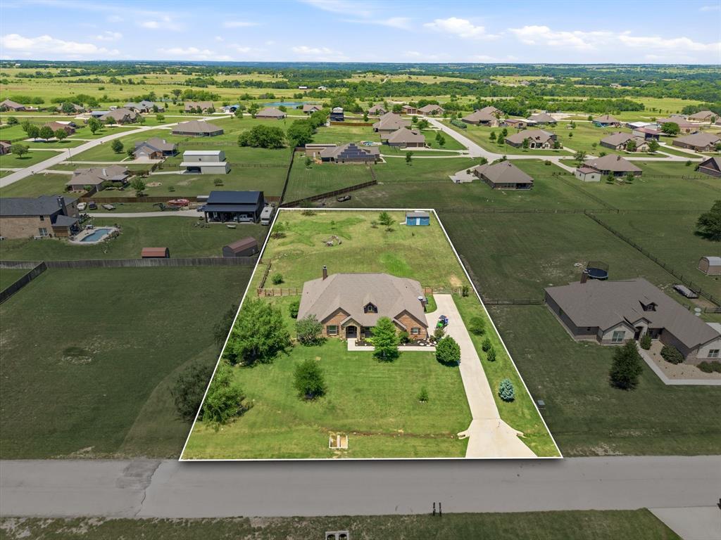 140 Heather Lane Decatur, TX 76234 - Photo 2 of 39 an aerial view of residential houses with outdoor space