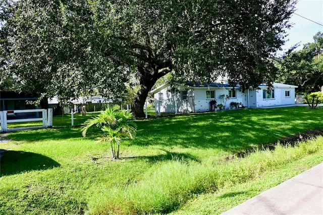 a house view with a garden space