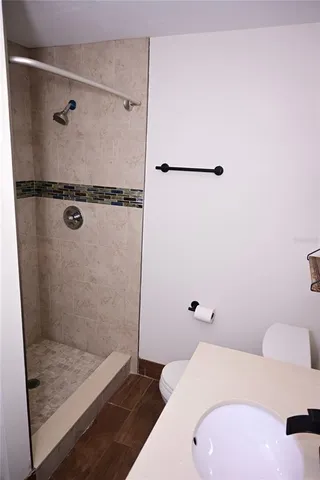 a bathroom with a bathtub and shower
