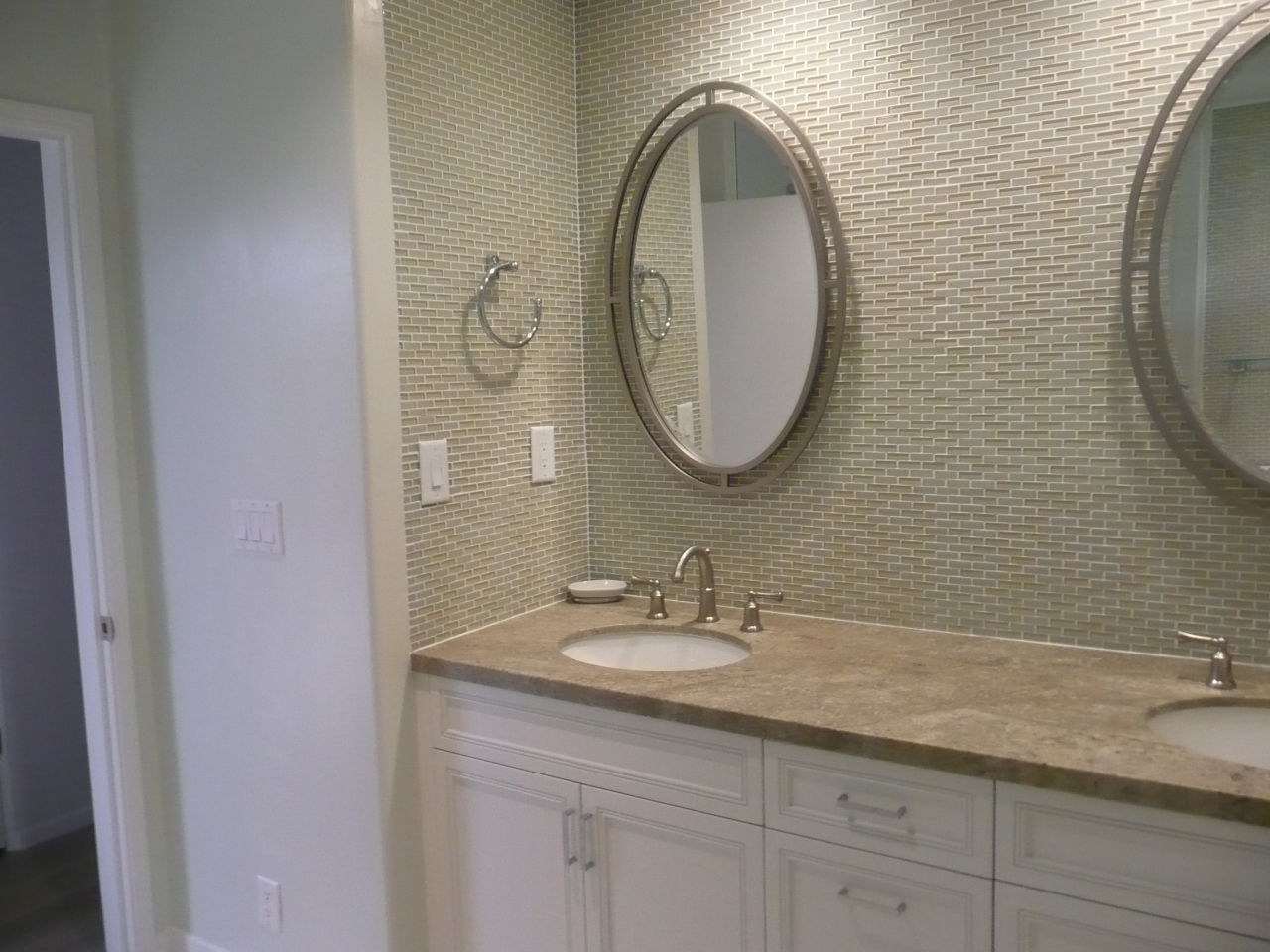 1126 Hill Road Santa Barbara, CA 93108 - Photo 4 of 8 a bathroom with a granite countertop double vanity sink and a mirror