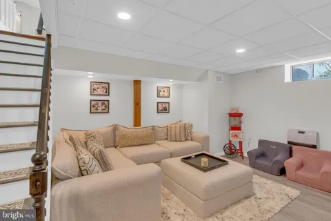 a living room with furniture and a couch