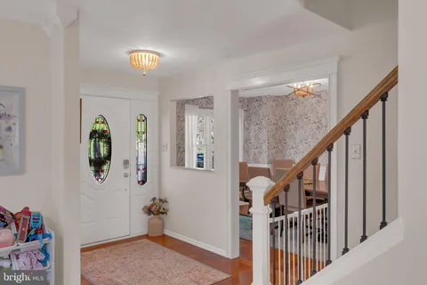 a view of entryway with stairs and furniture