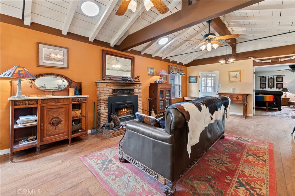 29972 Chihuahua Valley Road Warner Springs, CA 92086 - Photo 5 of 55 a living room with furniture and a fireplace