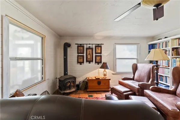 a living room with furniture or couch and a window