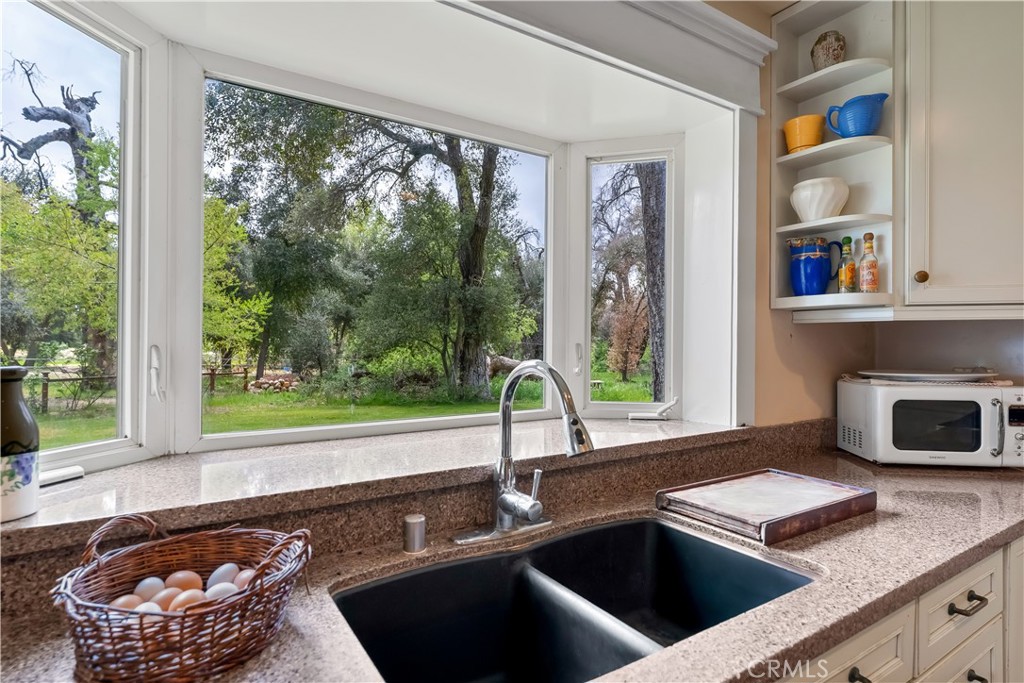 29972 Chihuahua Valley Road Warner Springs, CA 92086 - Photo 10 of 55 a kitchen with a sink and a large window