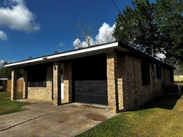 122 Rosa Street Edna, TX 77957 - Photo 2 of 17 a view of yellow house