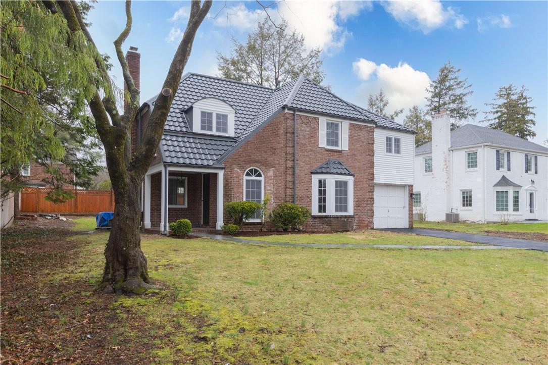 19 Windsor Road Scarsdale, NY 10583 - Photo 1 of 1 a front view of a house with a yard