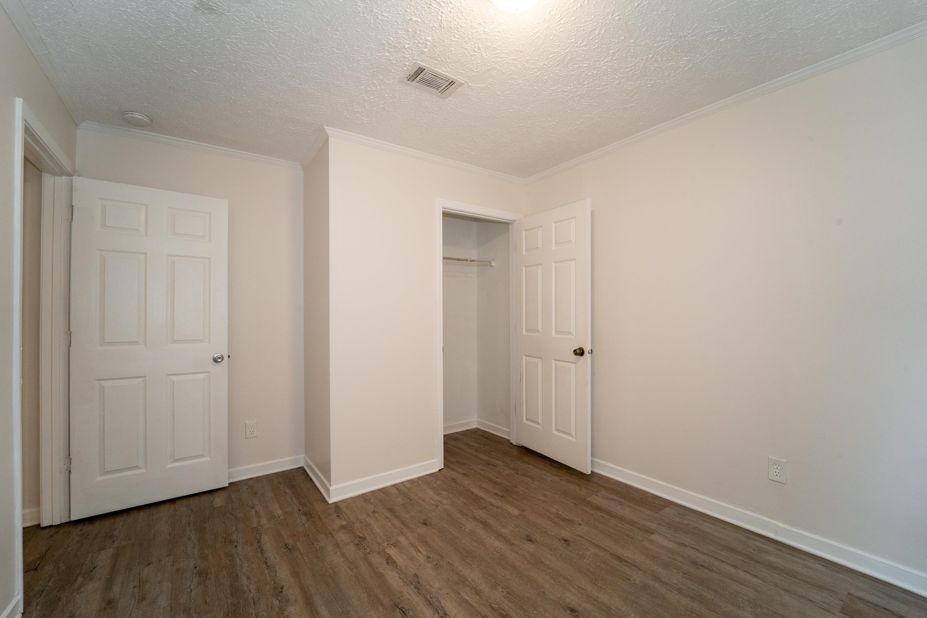 37 Evergreen Avenue, Unit A St. Augustine, FL 32084 - Photo 4 of 19 a view of an empty room with wooden floor