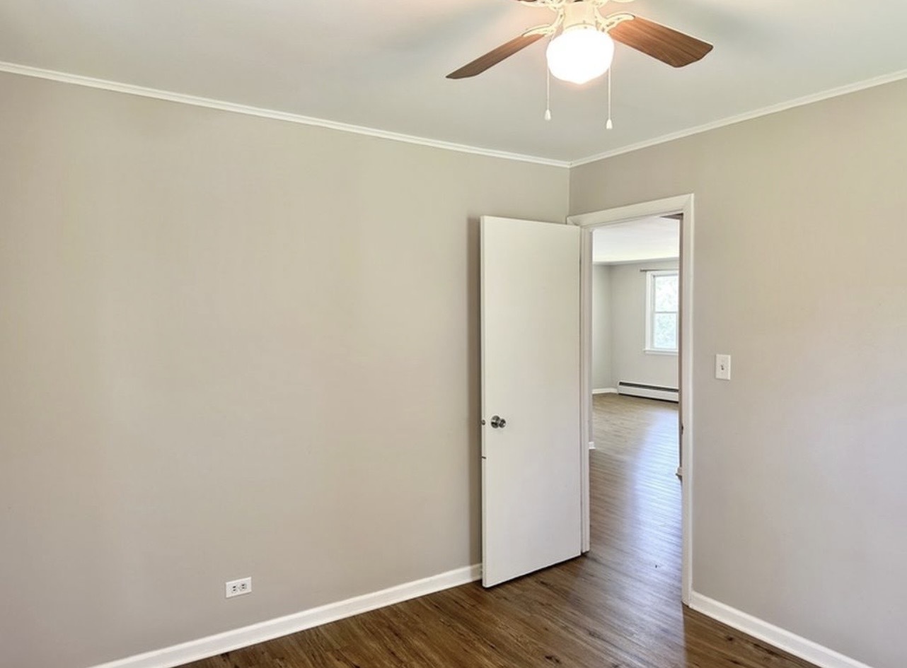 35339 North Hickory Lane Round Lake, IL 60073 - Photo 11 of 16 wooden floor in an empty room