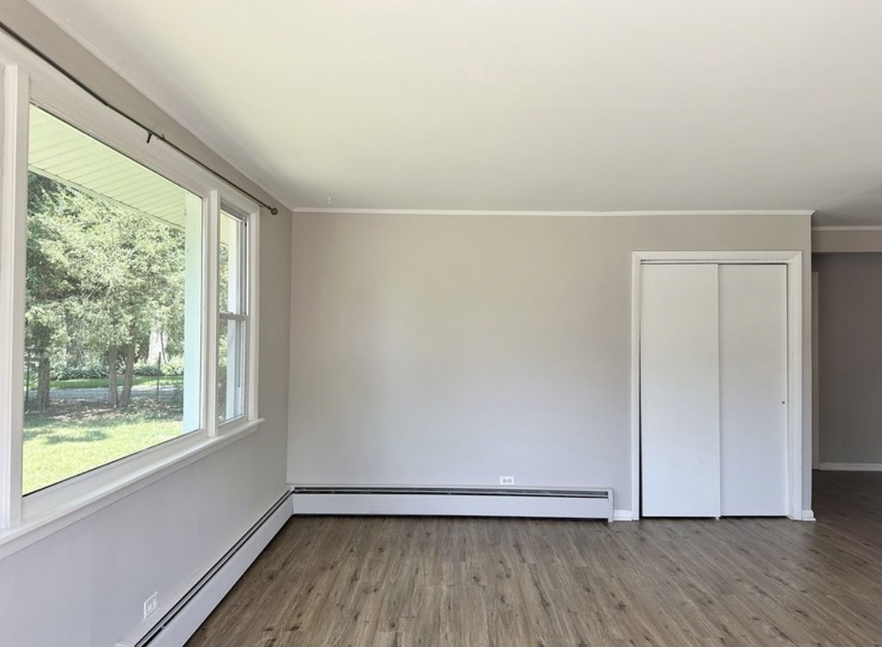 35339 North Hickory Lane Round Lake, IL 60073 - Photo 3 of 16 a view of room with window and wooden floor