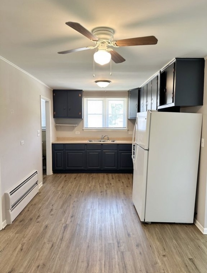 35339 North Hickory Lane Round Lake, IL 60073 - Photo 6 of 16 a room with furniture and flat screen tv