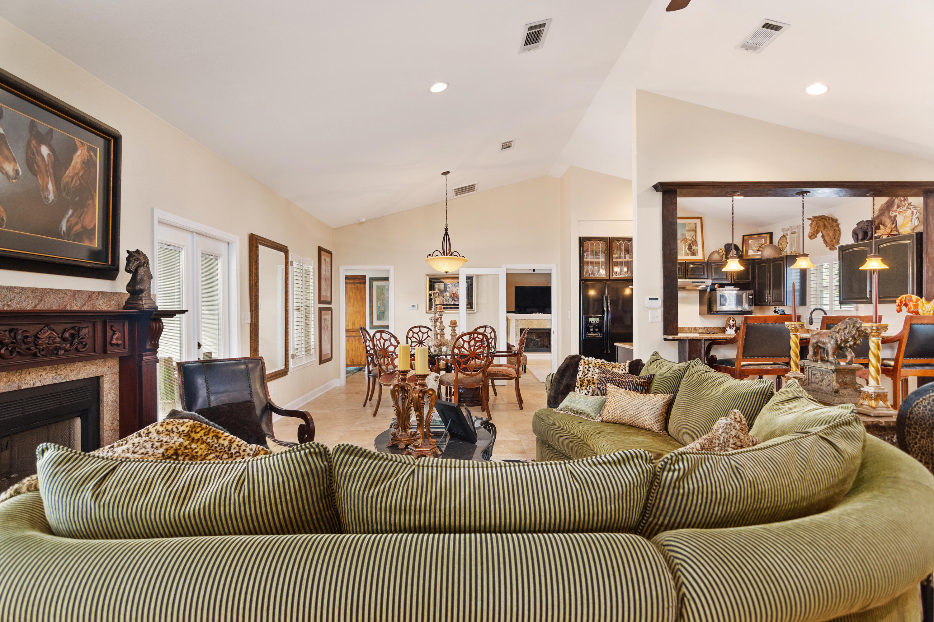 5676 Highway 2 DeFuniak Springs, FL 32433 - Photo 38 of 66 a living room with furniture fireplace and flat screen tv
