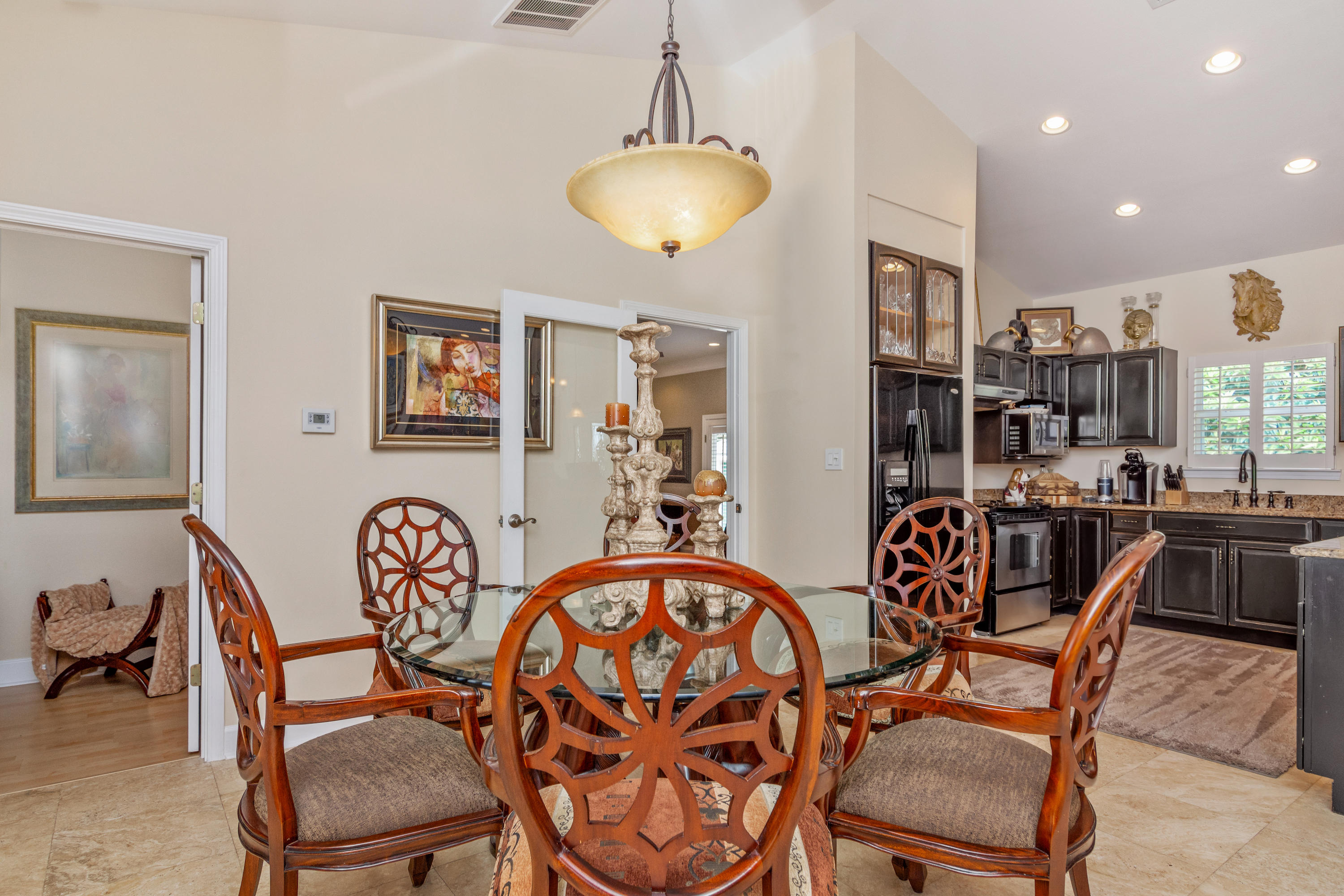5676 Highway 2 DeFuniak Springs, FL 32433 - Photo 41 of 66 a view of a dining room and hall with furniture