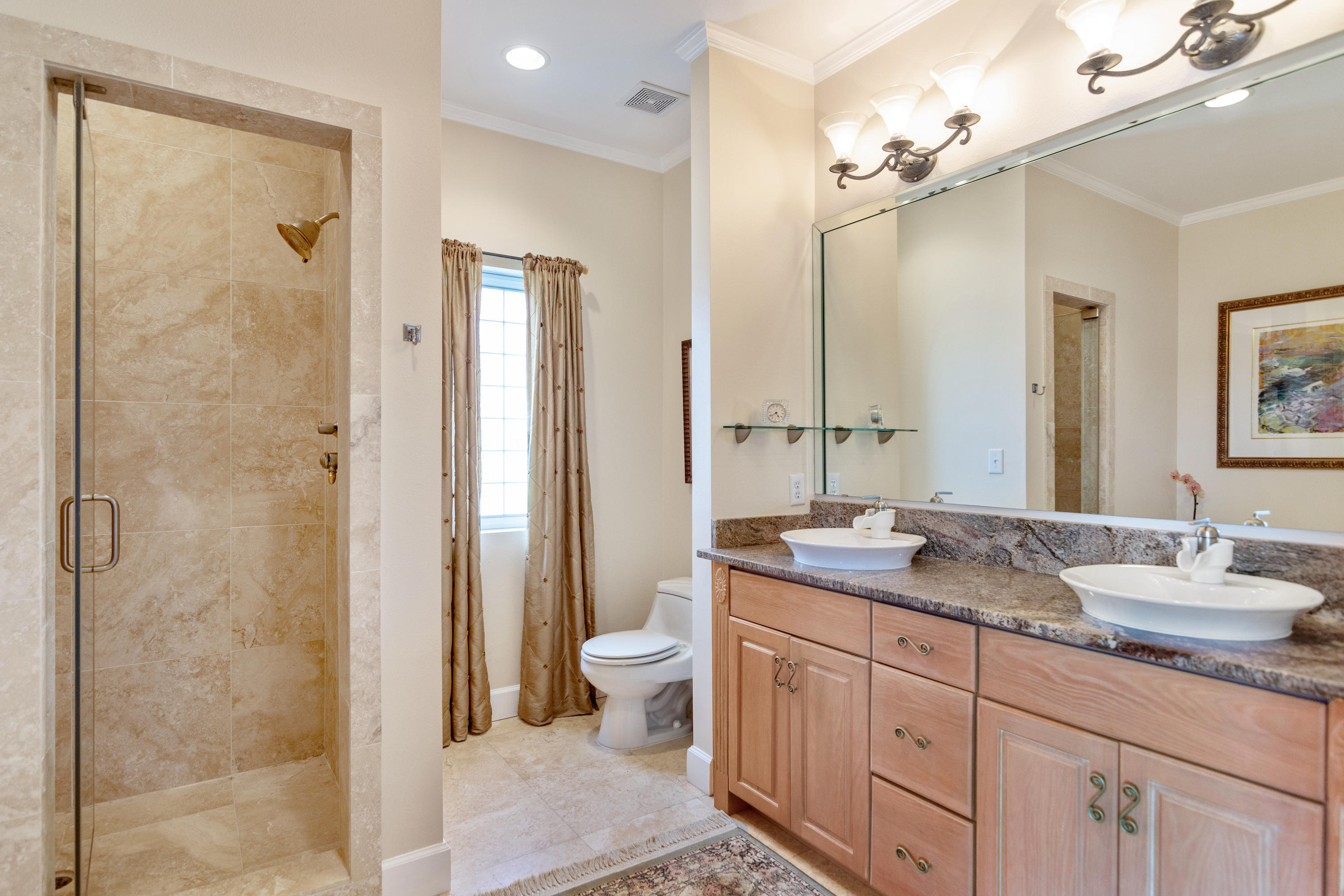 5676 Highway 2 DeFuniak Springs, FL 32433 - Photo 45 of 66 a bathroom with a granite countertop sink toilet and shower