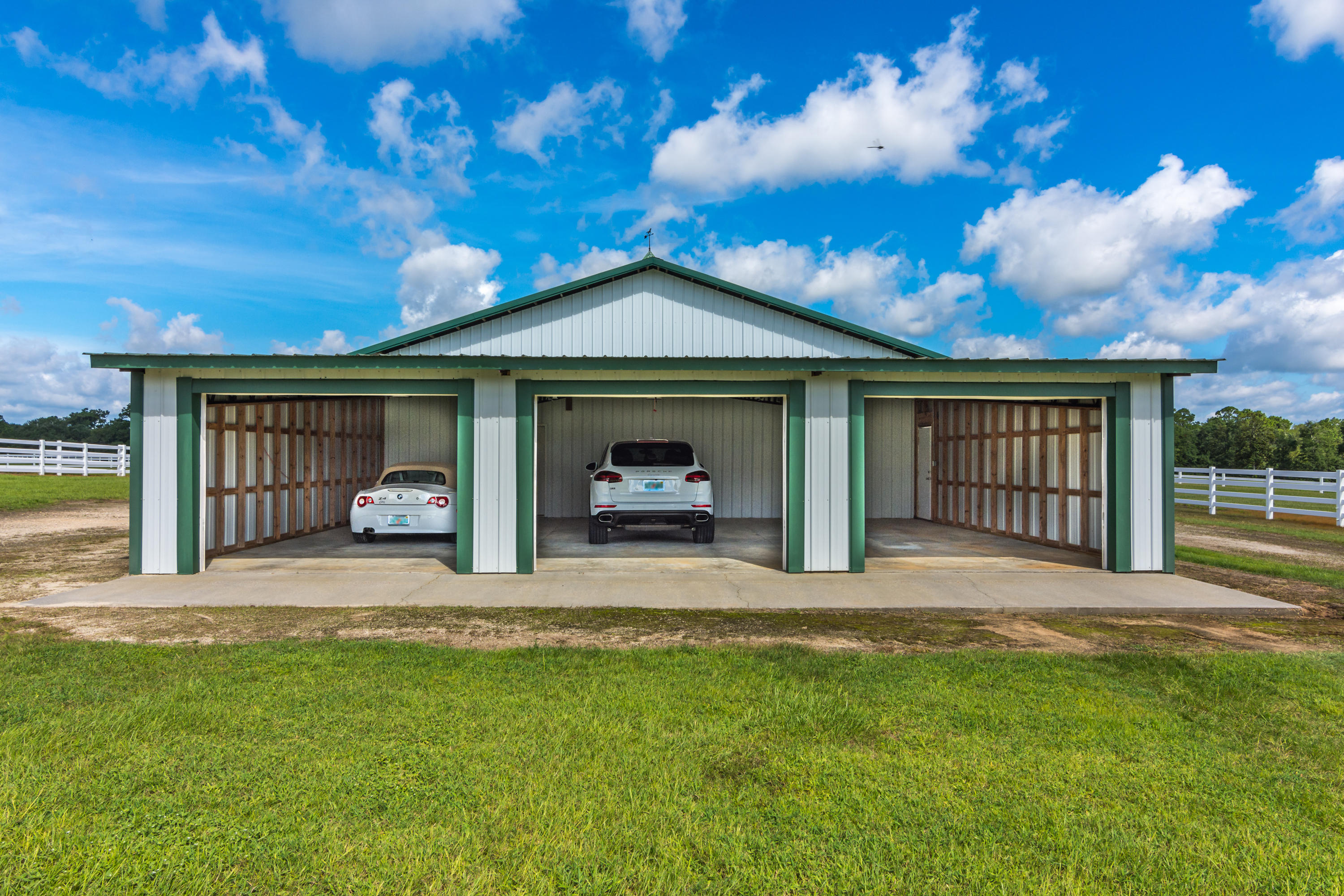 5676 Highway 2 DeFuniak Springs, FL 32433 - Photo 62 of 66 a view of a house with a yard and porch