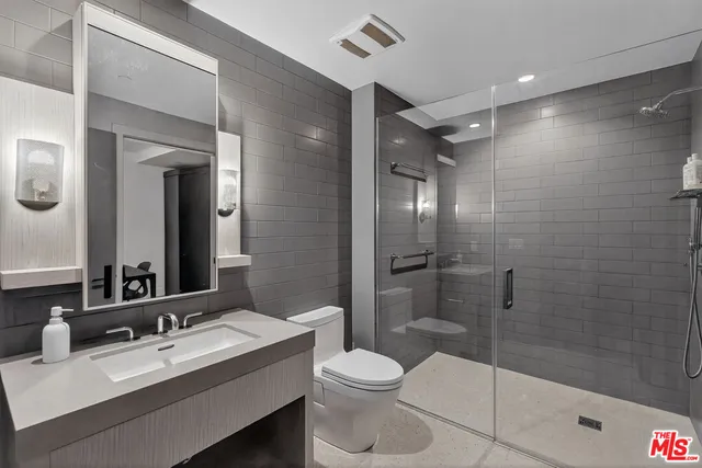 a outdoor living space with furniture and a fireplace