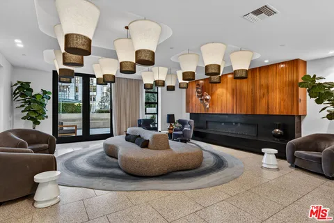 a kitchen with a table and chairs in it