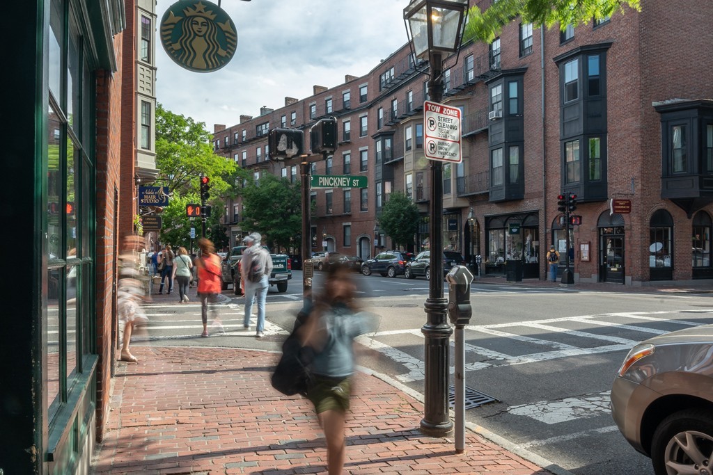 8 Lindall Place, Unit 2 Boston, MA 02114 - Photo 12 of 21 a street view with tall buildings and a fountain
