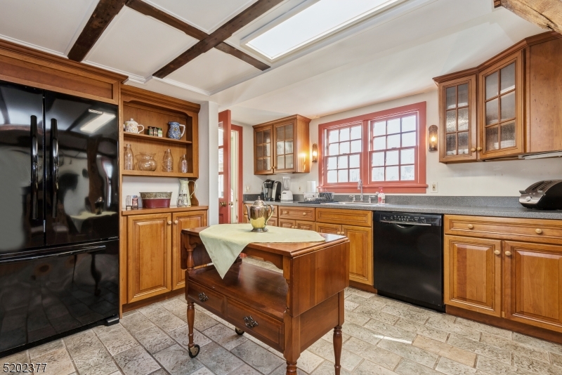 6 Hanover Road Florham Park, NJ 07932 - Photo 6 of 26 a large kitchen with stainless steel appliances granite countertop a stove a sink dishwasher and a refrigerator