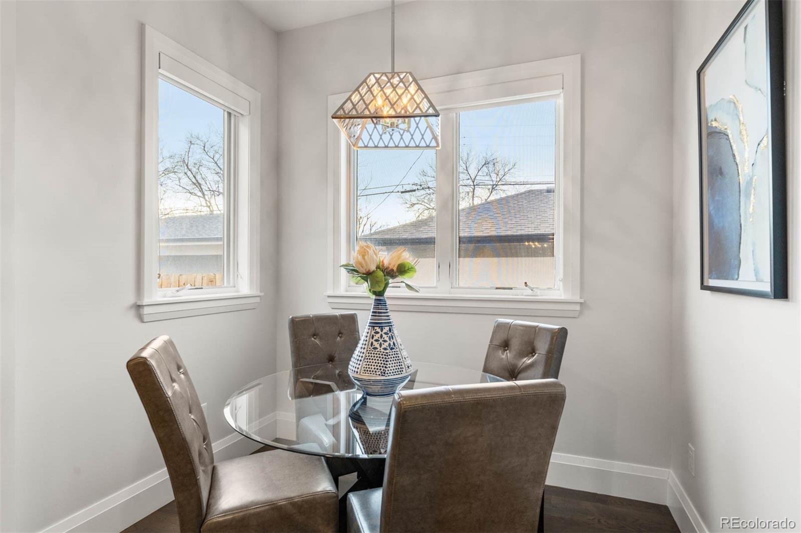 1645 South Cook Street Denver, CO 80210 - Photo 16 of 48 a dining room with furniture and window