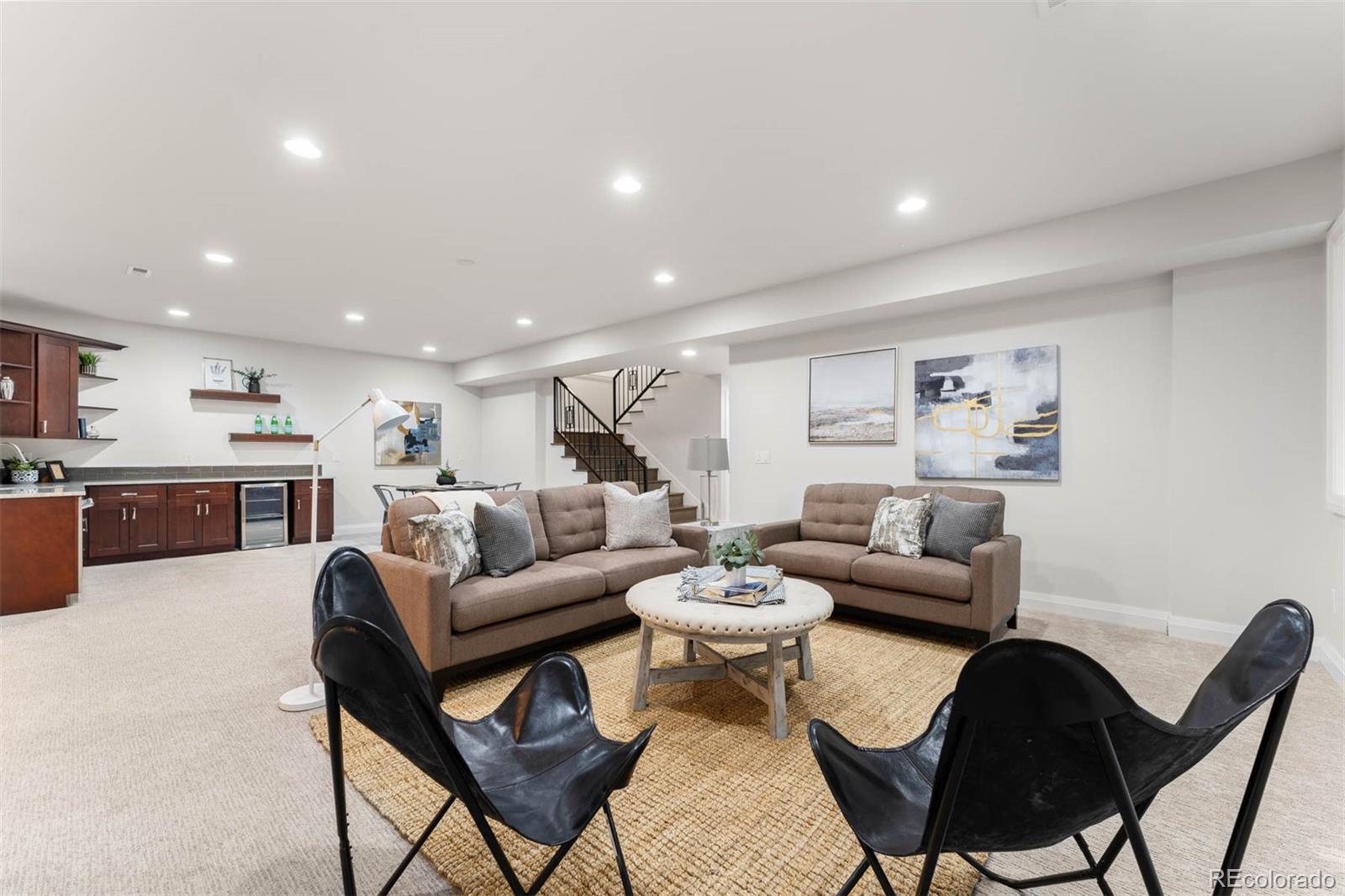 1645 South Cook Street Denver, CO 80210 - Photo 42 of 48 a living room with furniture and a view of kitchen