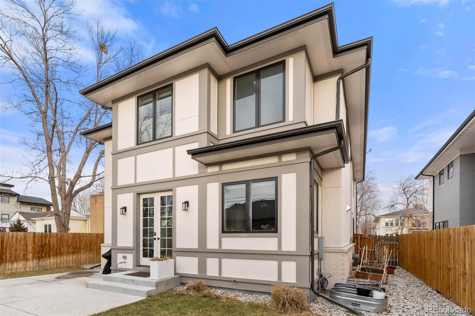 1645 South Cook Street Denver, CO 80210 - Photo 47 of 48 a front view of a house with a street