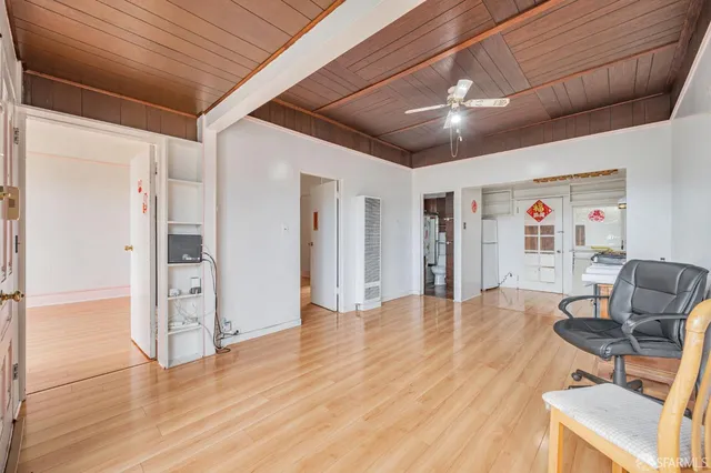 a view of livingroom with furniture and wooden floor