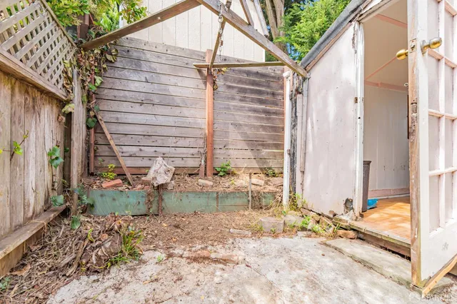 a view of deck with wooden floor and outdoor seating