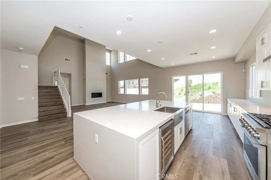 6521 Canyon Oaks Drive Simi Valley, CA 93063 - Photo 11 of 39 a kitchen with sink and wooden floor