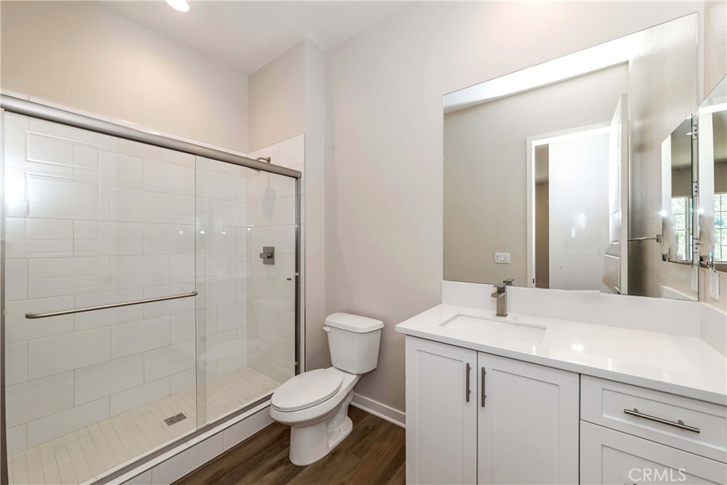 6521 Canyon Oaks Drive Simi Valley, CA 93063 - Photo 16 of 39 a bathroom with a granite countertop sink toilet and shower