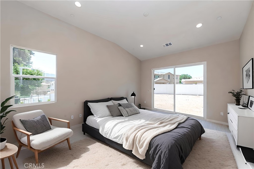 6521 Canyon Oaks Drive Simi Valley, CA 93063 - Photo 21 of 39 a bedroom with a bed and a couch