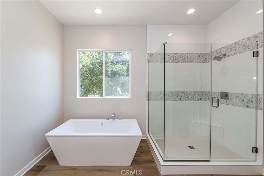 6521 Canyon Oaks Drive Simi Valley, CA 93063 - Photo 24 of 39 a bathroom with a tub and shower