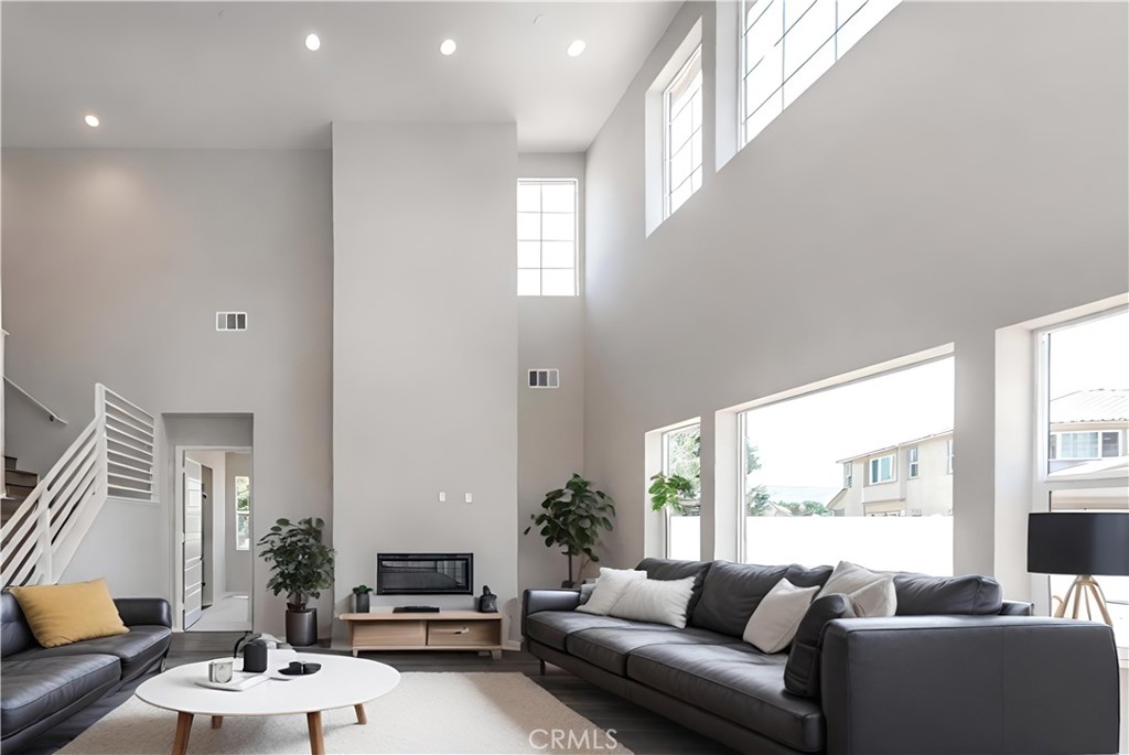 6521 Canyon Oaks Drive Simi Valley, CA 93063 - Photo 3 of 39 a living room with furniture and a large window