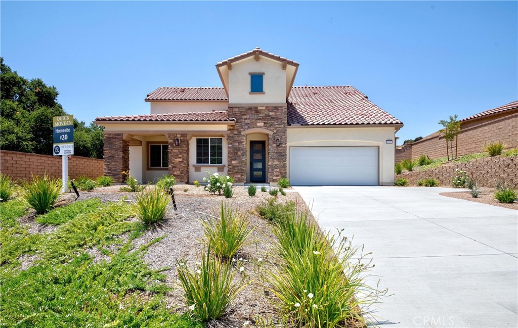 6521 Canyon Oaks Drive Simi Valley, CA 93063 - Photo 34 of 39 a front view of a house with garden